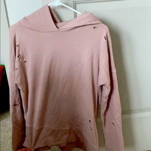 Sweatshirt with intentional holes